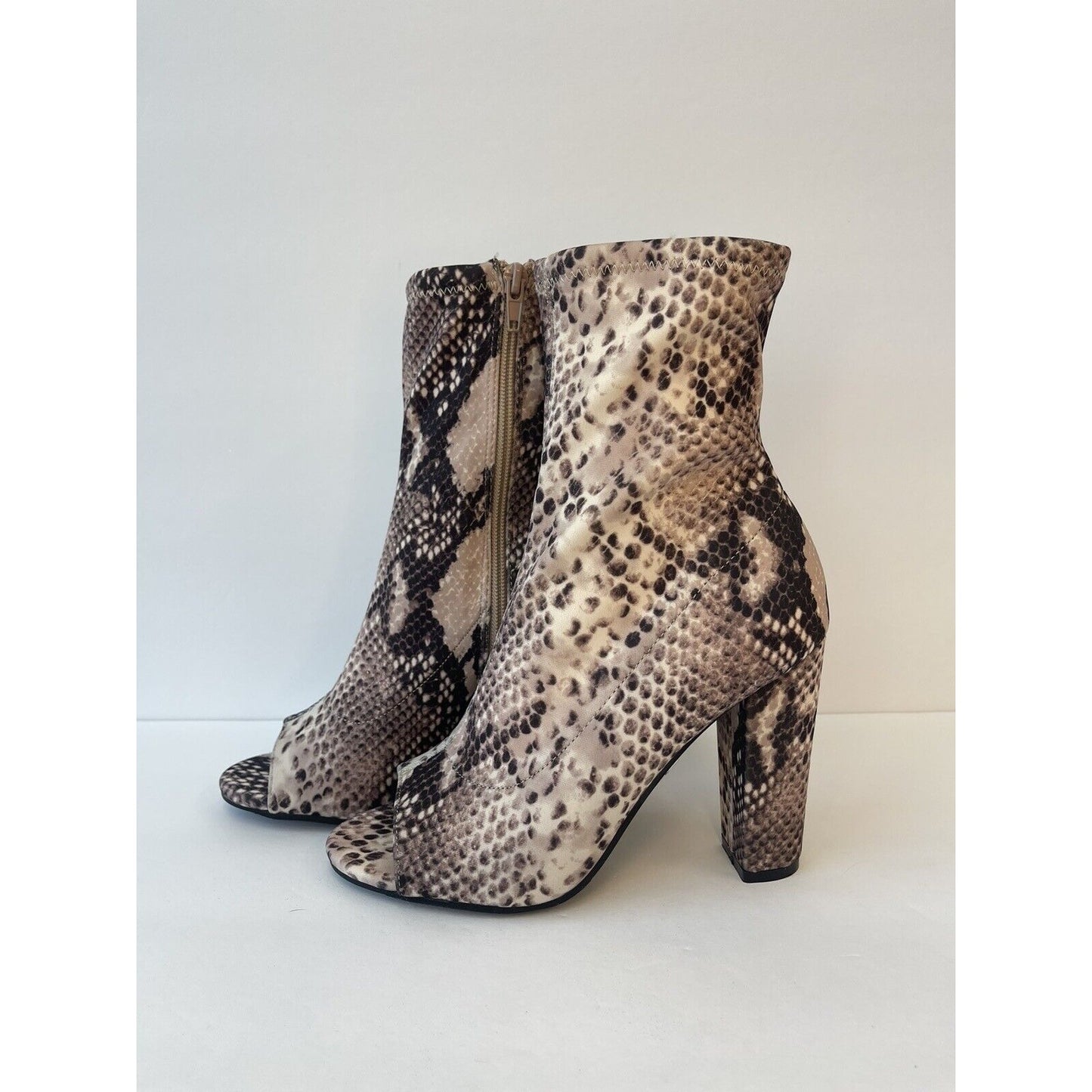 Womens high heels booties ankle/ Size Us 5.5/ snake